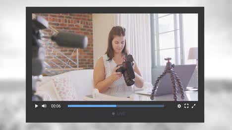 animation of social media screen over caucasian woman with camera at home