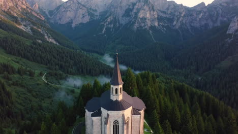 alpine chapel at sunrise