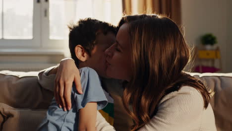 a boy and a woman share a range of playful and tender moments