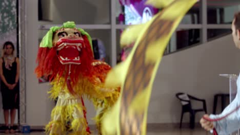 traditional heritage, colourful outdoor celebration, mythical creature