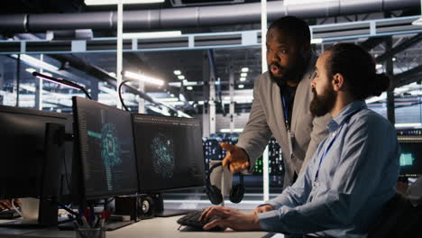 vertical video supervisor in server room monitoring worker managing ai training datasets