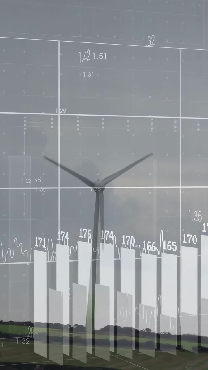 Vertical video: Turbine rotating on ridge energy feed starting layering grid wave bars monitoring