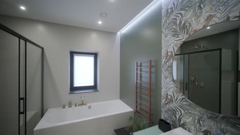 modern tiled bathroom with shower in modern home, real estate interior. wide shot footage