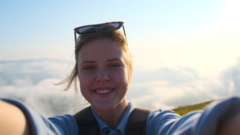 happy woman selfie on mountain top