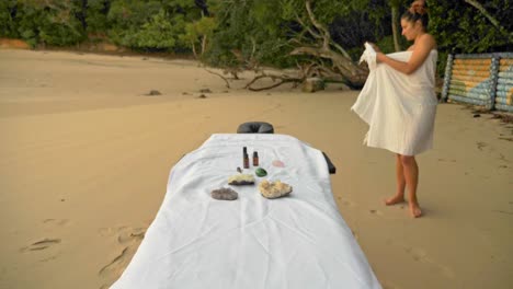 yoni eggs and essential oils on massage table at echo beach