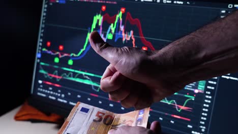 Male-hands-counting-Euro-bills-from-investment-profit-and-thumb-up