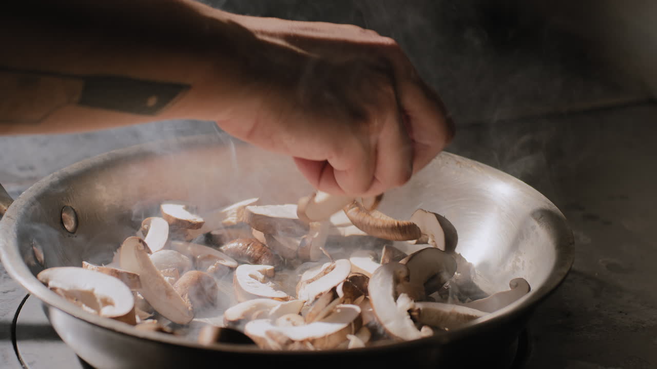Mushrooms Being Saut&eacute;ed in a Hot Pan