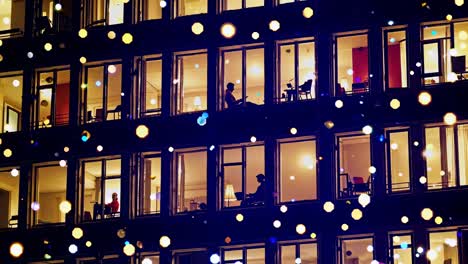 people working late night in apartment building