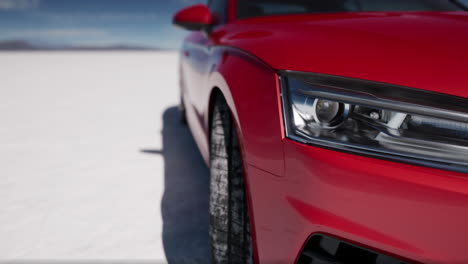 red audi coupe on salt flats