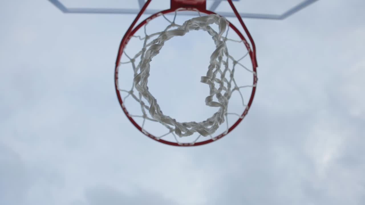Basketball Ring With Net Against The Blue Sky - Basketball Hoop In The Court. - zoom out