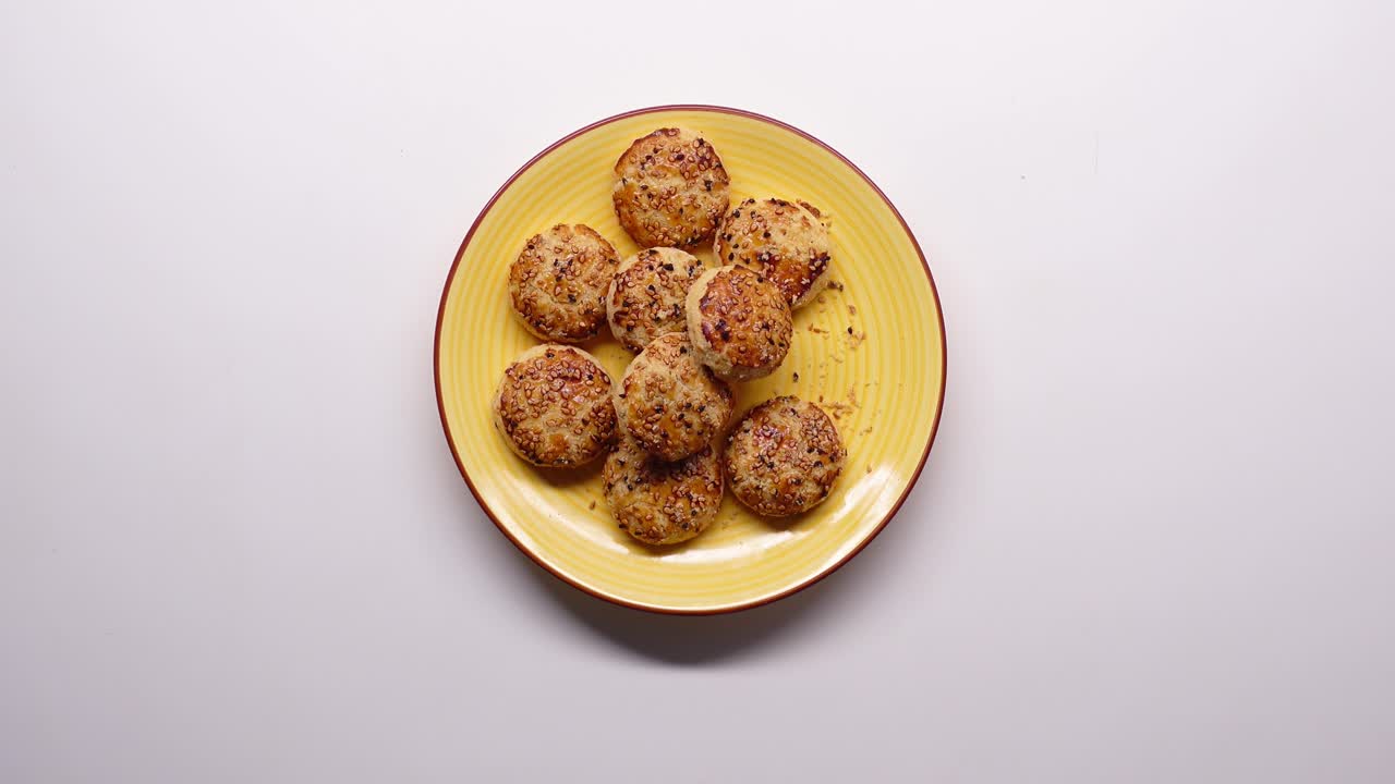Homemade sesame seed cookies on a plate