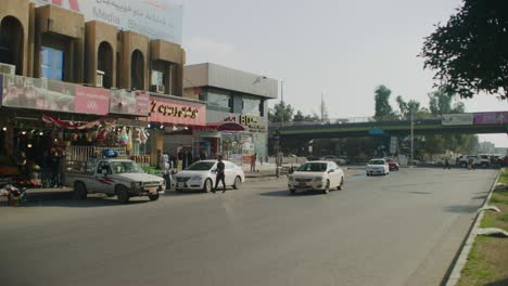 traffic and every day life near the jalil khayat mosque in erbil, iraq