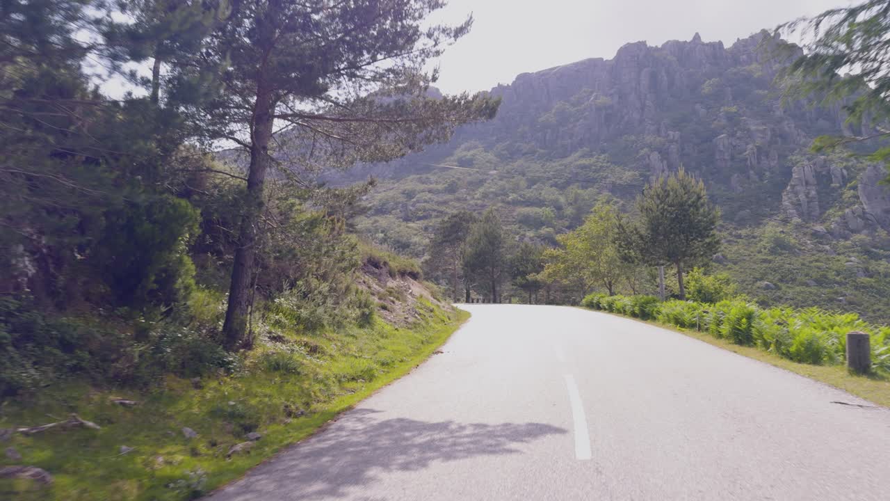 Driving on the asphalt road through the Peneda Geres nature park.
