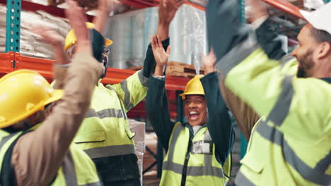 warehouse employees celebrating success