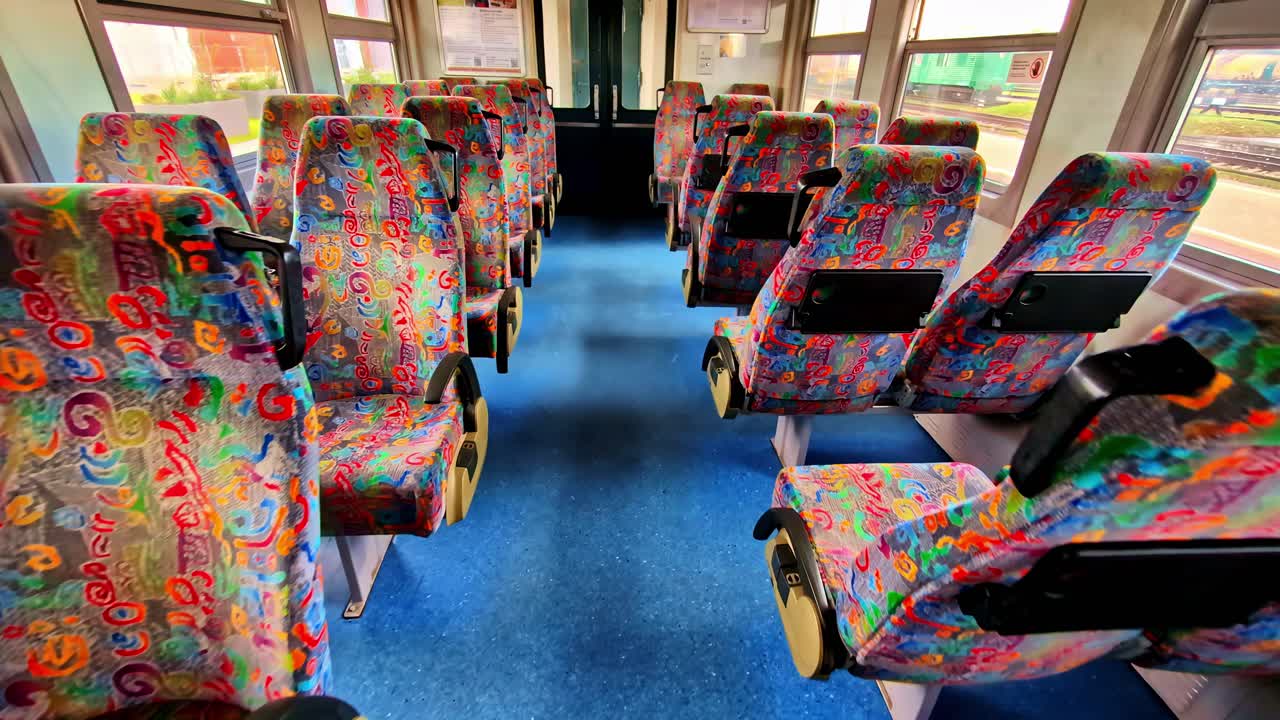 Old soviet era train interior colourful seats Latvia Baltic country post communist