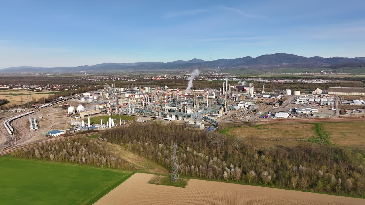 Alsachemie plant near rhine, large industrial complex, clear day, aerial view