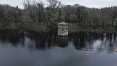 temple at lough key, an old lakeside structure in roscommon, ireland, surrounded by trees