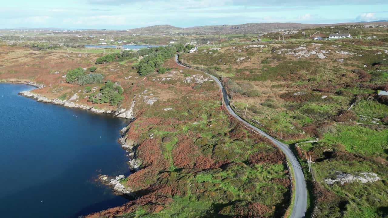 Single Lane Of The Sky Road In Connemara, Clifden Bay, Ireland. Aerial Drone Shot