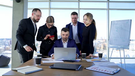 corporate presentation for businesspeople in office. motivated team leader explaining company development strategy