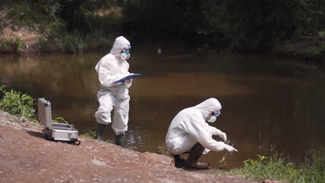 environmental scientists testing water quality