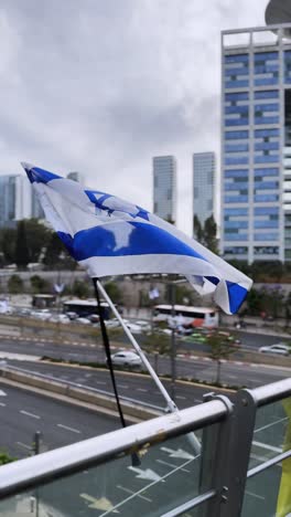 israeli flag waving in city