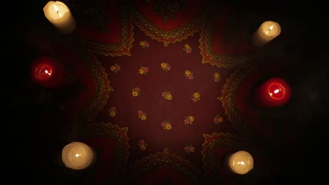 candles arranged on a patterned cloth