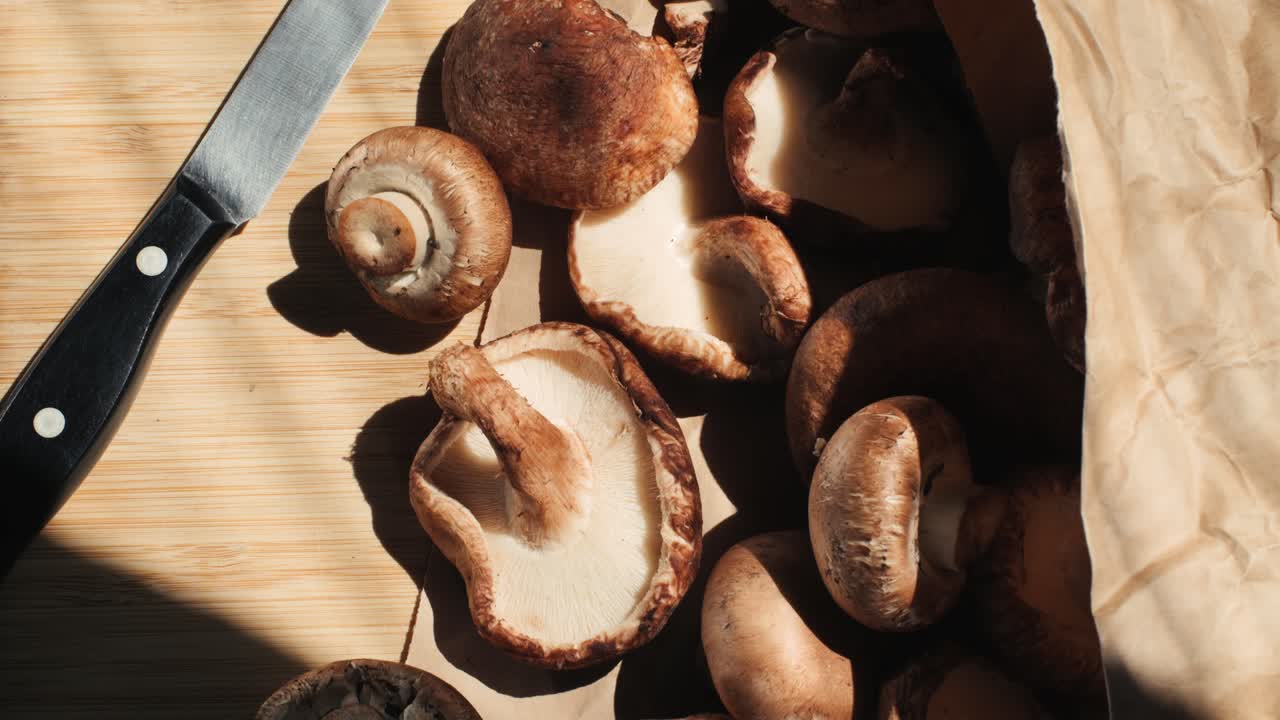 Fresh Shiitake Mushrooms on a Wooden Board