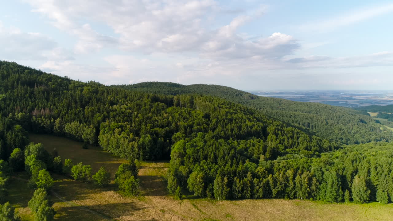 Free stock video - Aerialof beautiful green forest in a rural landscape 1