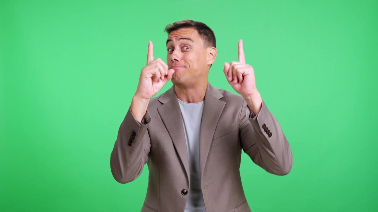 Funny mature businessman making silly faces and dancing