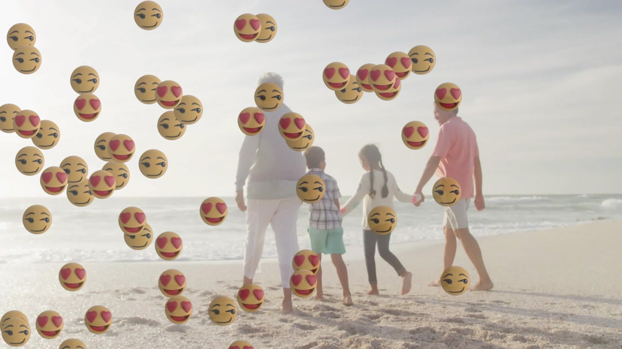 Family walking toward water leaving prints while emoji appearing left filling front showing love
