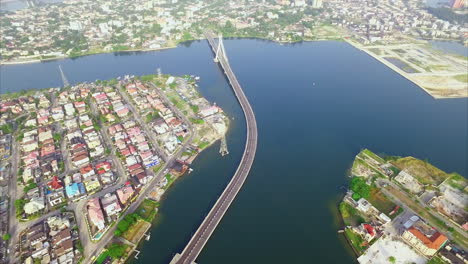 the lekki-ikoyi link toll bridge in lagos, nigeria - high altitude aerial reveal