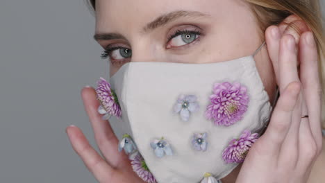 close up of woman in face mask with flowers