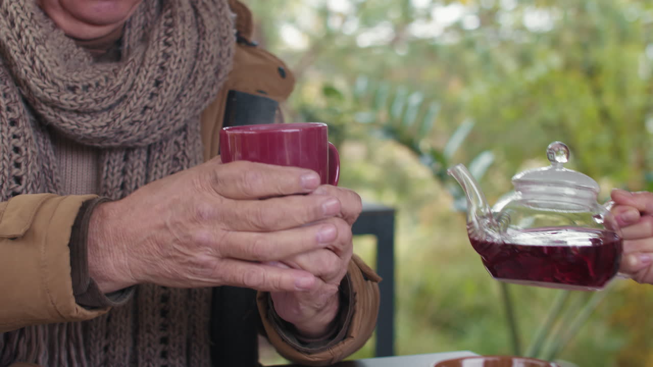 Pouring Tea Outdoors