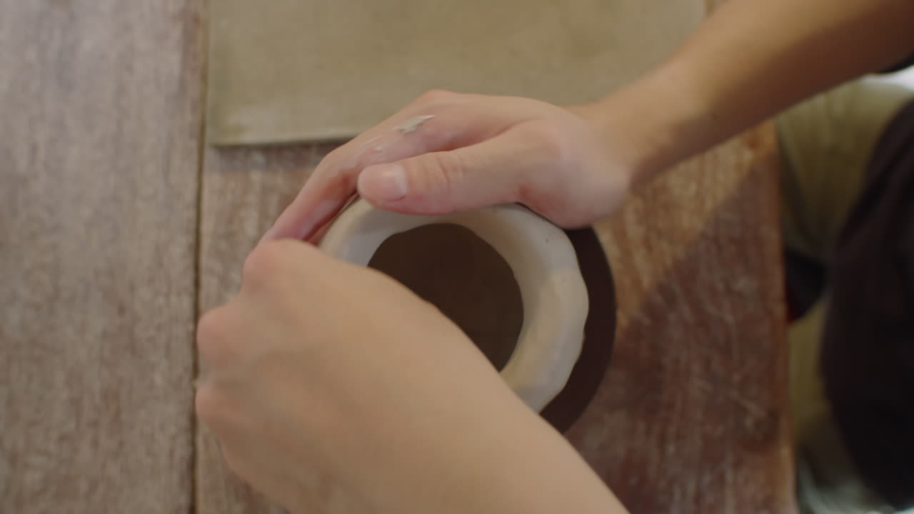 Hands of Ceramist Throwing Clay Vase on Pottery Wheel