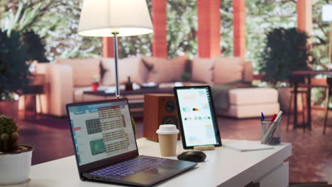 Empty-home-setup-desk-filled-with-documents-and-financial-reports