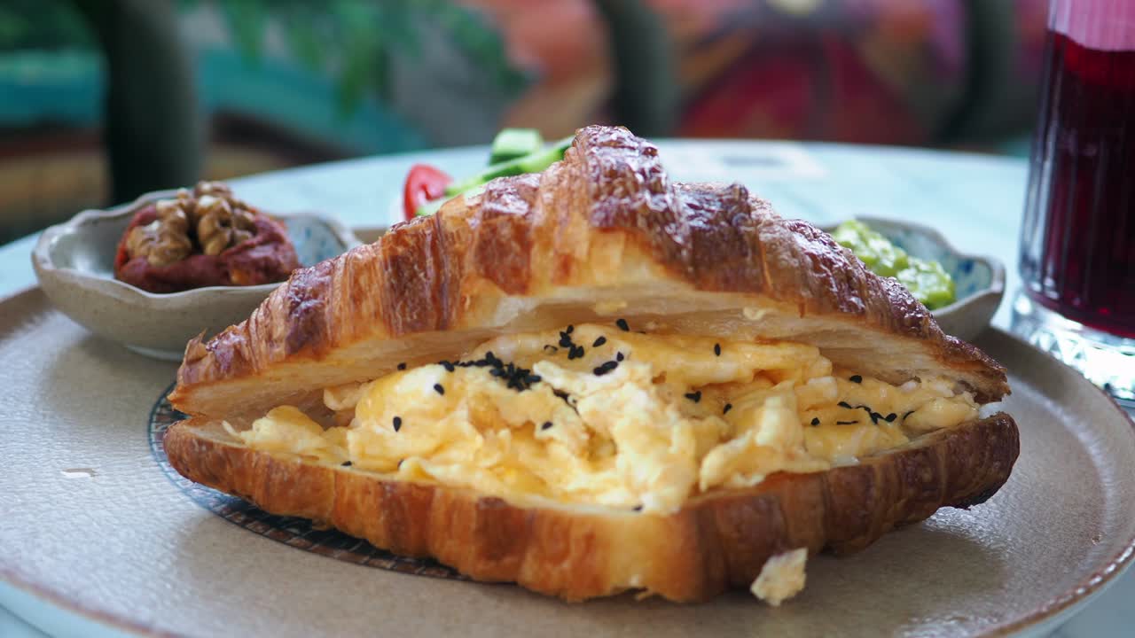 Croissant filled with scrambled eggs