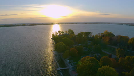 Sunset-over-the-water-off-of-a-peninsula