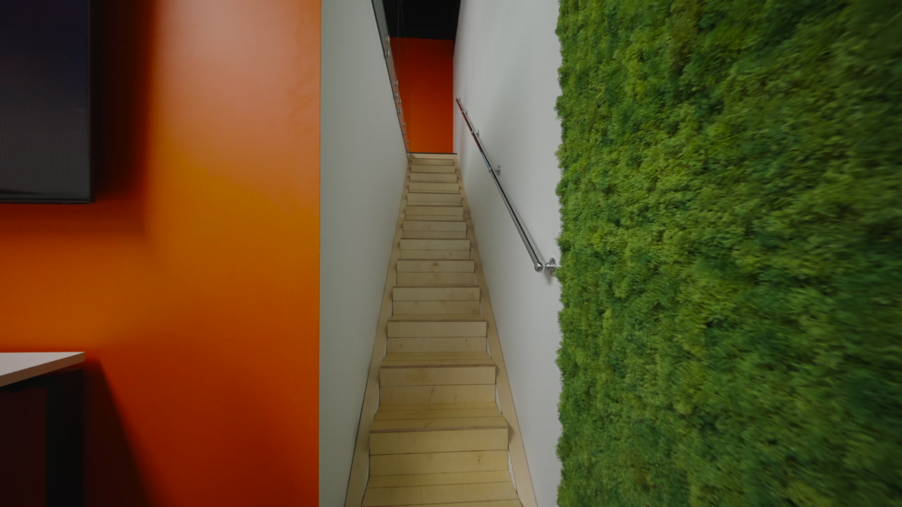 Wooden Staircase Rising Toward Orange Corridor, Metal Handrail, Narrow Passage, Moss Wall Biophilic Accent,. Creative