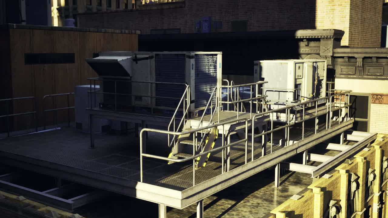 Rooftop mechanical systems in an urban setting during afternoon light