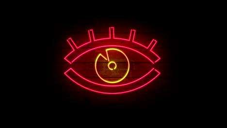 icono de ojo de neón en la pared de ladrillo