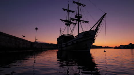 pirate ship silhouette at sunset