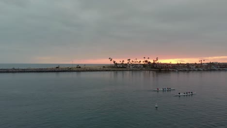 Canoe-at-sunset-in-Newport-Bay,-California