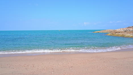 vibrant color contrast in paradisiac golden bay with turquoise waters