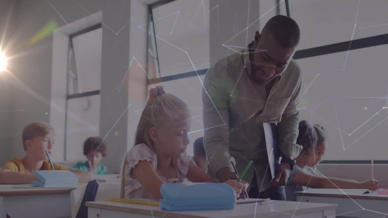 Animation of networks over happy african american male teacher and schoolgirl at desk in class