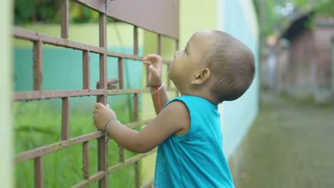 a child is having fun playing alone on the street