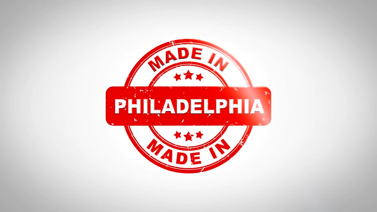 필라델피아에서 만들어진 서명 스핑 텍스트 목조 스프 애니메이션 은 잉크와 깨한  종이 표면 배경과 녹색 매트 배경이 포함되어 있습니다.