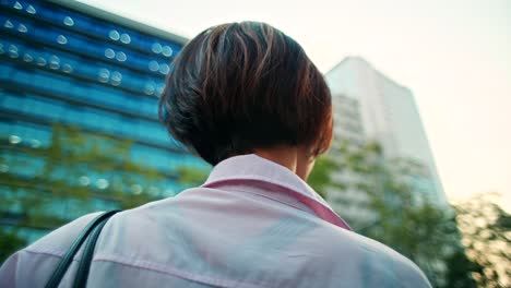 woman walking in a japanese city