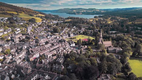 aerial drone footage of ambleside, a small town in the lake district, has now become a major tourist resort with shops, restaurants