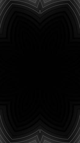 black and white photo of flower with black background. kaleidoscope vj loop vertical