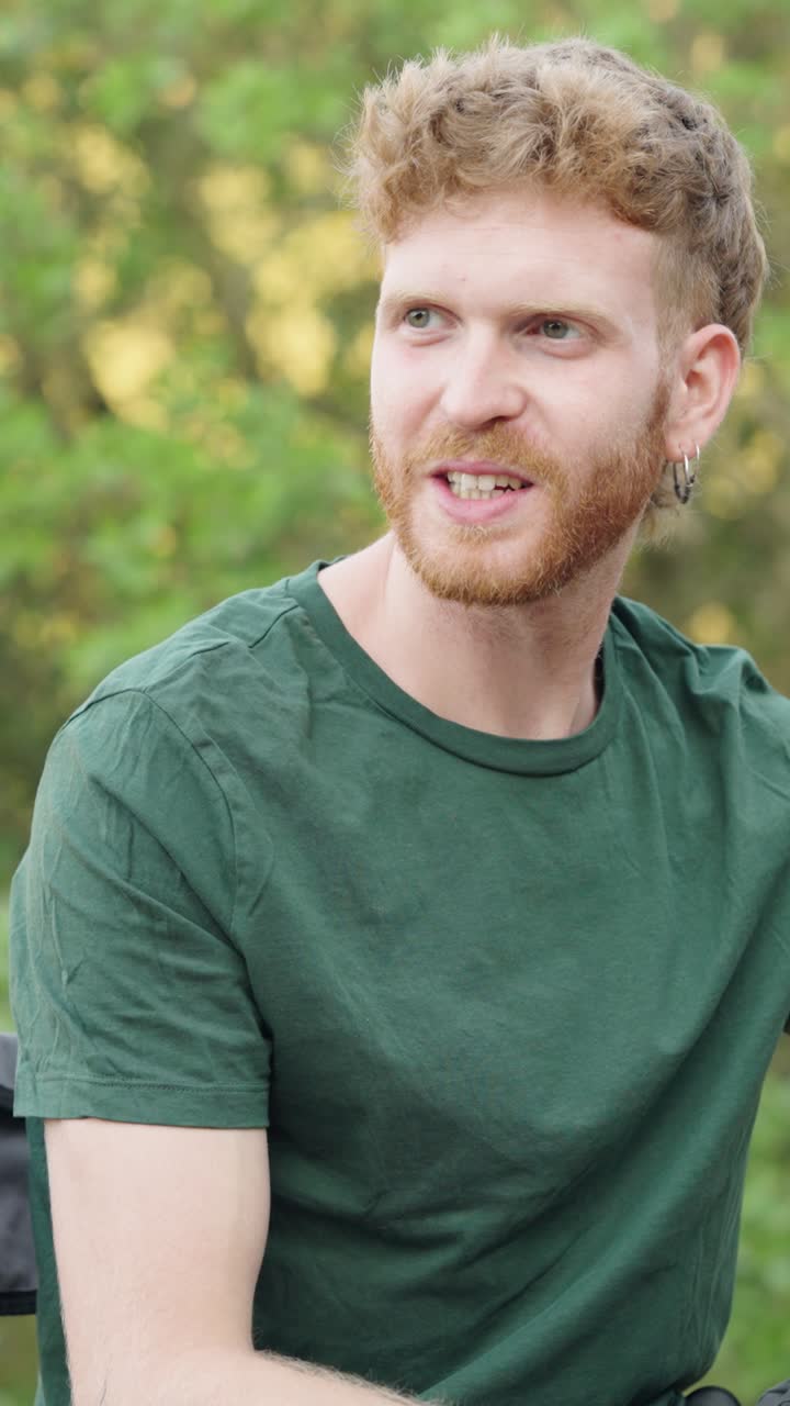 People conversing outdoors in casual attire